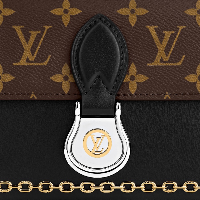 This Louis Vuitton bag had a clip missing, which joined the handle to the  bag. We replaced the clip and the four gold screws…